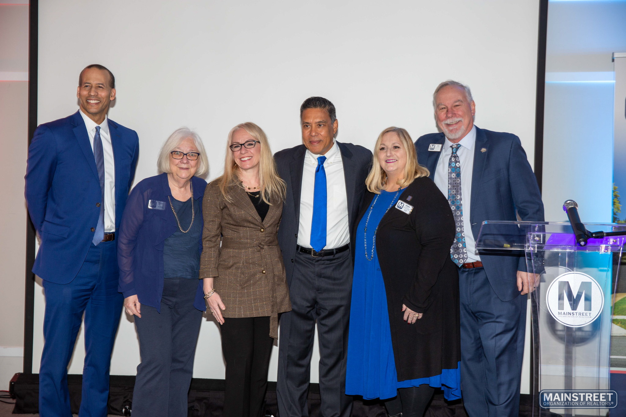 Group photo of speaker Dan Seals, Karen Kramford, Rebecca Jensen, Dr. Anthony Chan, Debbie Pawlowicz, and John Gormley